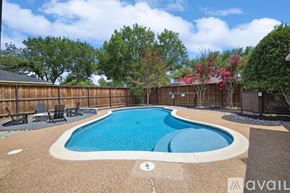 Allen house for rent - A small pool surrounded by a wooden fence and trees.