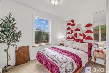 Bangor townhouse for rent - A kitchen area with a counter and cabinets is visible through an open door.