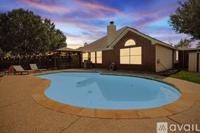 Corinth house for rent - A backyard with a pool and a house.