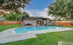 Friendswood house for rent - A house with a pool in the backyard.