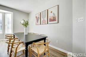 Lewisville house for rent - A dining room with a table and chairs.