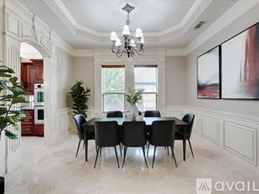 Kennedale house for rent - A dining room with a large table and chairs.