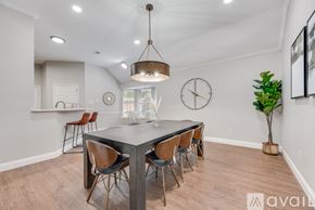 North Richland Hills house for rent - A dining room with a table and chairs.