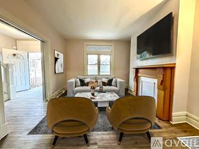 Pittsburgh house for rent - A kitchen with a stainless steel refrigerator, microwave, and oven.
