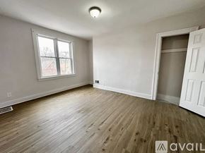 Pittsburgh house for rent - A room with wooden flooring and a window.