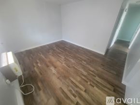 La Crosse apartment for rent - A kitchen with a white fridge and a white stove top oven.