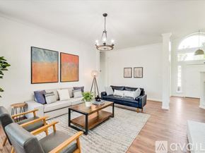 Rockwall house for rent - A dining room with a long table and chairs.