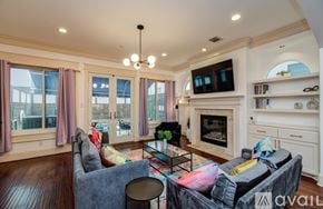 Houston house for rent - A kitchen with a stainless steel oven and blue cabinets.