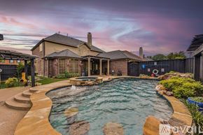 Plano house for rent - A house with a pool in the backyard.