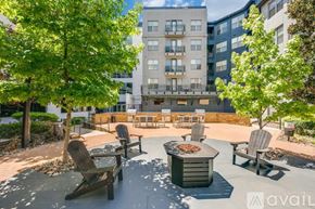 Dallas apartment for rent - A sunny day at an outdoor seating area with a table full of nuts.