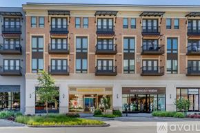 Fort Worth apartment for rent - A building with a balcony on the second floor.