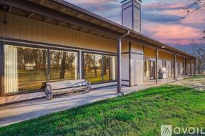 Celina house for rent - A building with a bench in front of it.