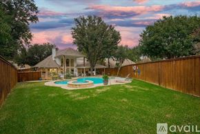 Grand Prairie house for rent - A backyard with a pool and a house.