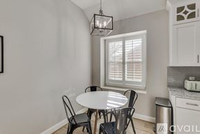 Rowlett house for rent - A dining area with a table and chairs.