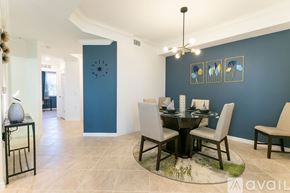 Punta Gorda condo for rent - A dining room with a table set for four.