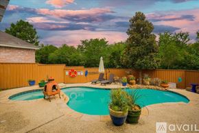 Mesquite house for rent - A backyard with a pool and patio furniture.