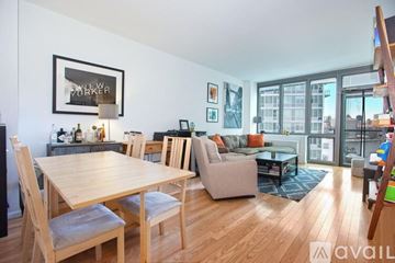 Manhattan apartment for rent - A living room with a dining table and chairs.