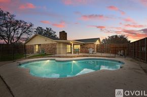 Carrollton house for rent - A house with a pool in the backyard.
