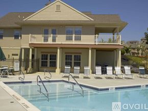 Mountville apartment for rent - A large house with a pool in front.