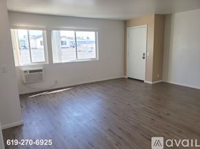 El Cajon apartment for rent - A room with a door and a light on the ceiling.