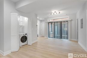 Chicago apartment for rent - A modern laundry room with a washer and dryer.