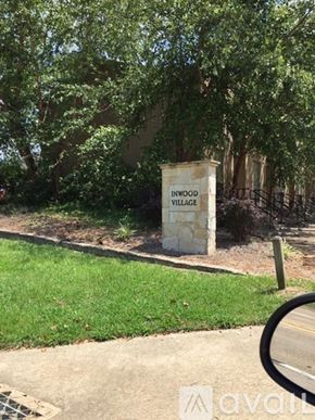 Ruston townhouse for rent - A sign that says "Inwood Village" stands in a grassy area.