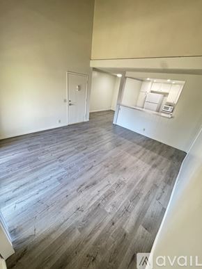 Azusa condo for rent - A living room with a sofa, chairs, and a television.