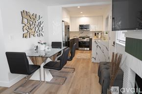 Los Angeles apartment for rent - A modern kitchen with a dining table and chairs.