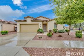 Phoenix apartment for rent - A house with a garage and a driveway in front of it.