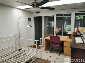 Laguna Woods condo for rent - A bathroom with a sink, toilet, and shower.