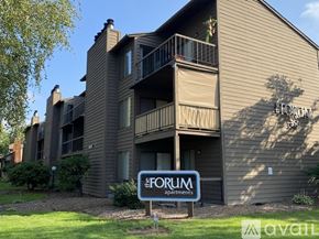 Salem apartment for rent - A building with a sign that says "FORUM Apartments".