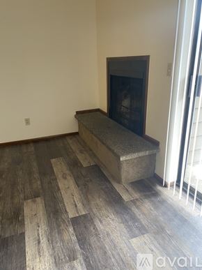Salem apartment for rent - A living room with a fireplace and a television.