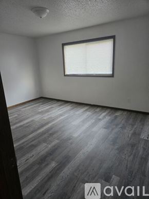 Waterloo apartment for rent - A white apartment building with a walkway in front.