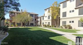 Phoenix apartment for rent - A grassy area in front of apartment buildings.