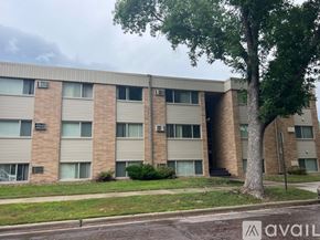 Mankato apartment for rent - A building with a tree in front of it.
