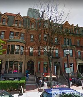 Boston apartment for rent - A street view of a building with the text "Boston Proper Real Estate" on it.