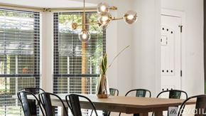 Greenville house for rent - A dining room with a table, chairs, and a chandelier.