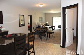 Mankato apartment for rent - A dining room with a table set for six.