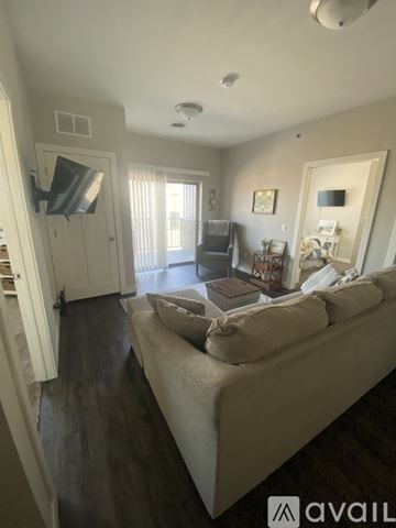 Mankato apartment for rent - A living room with a couch and a television.