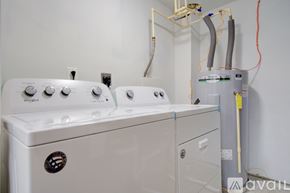 Washington apartment for rent - A Whirlpool washing machine and dryer are available for purchase.