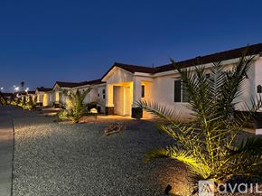 Lake Havasu City condo for rent - A row of houses with lights on at night.