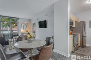 San Diego condo for rent - A modern kitchen with a dining table and chairs.