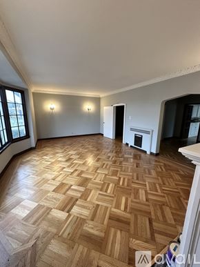 San Francisco apartment for rent - A room with wooden flooring and white walls.