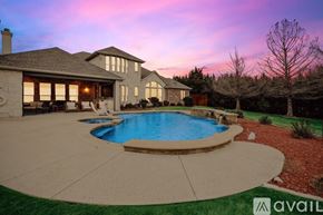 Rowlett house for rent - A house with a pool in the backyard.