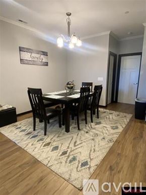 North Mankato townhouse for rent - A dining room with a table and chairs.