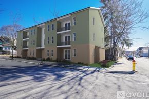 Altoona apartment for rent - A building with a parking lot in front of it.