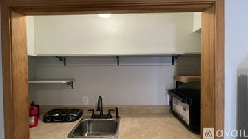 San Martin apartment for rent - A kitchen with a sink and a stove top.