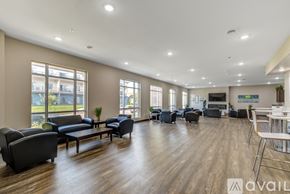 Mankato apartment for rent - A spacious living room with a variety of seating options and a television.