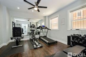 Chicago apartment for rent - A well-equipped home gym with a variety of exercise machines.