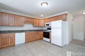 Millersville apartment for rent - A large empty room with a carpeted floor and a window.
